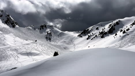 aerial shot amazing alpine landscape epic mountains ski resort les arcs savoie france mystic black clouds fresh snow pow