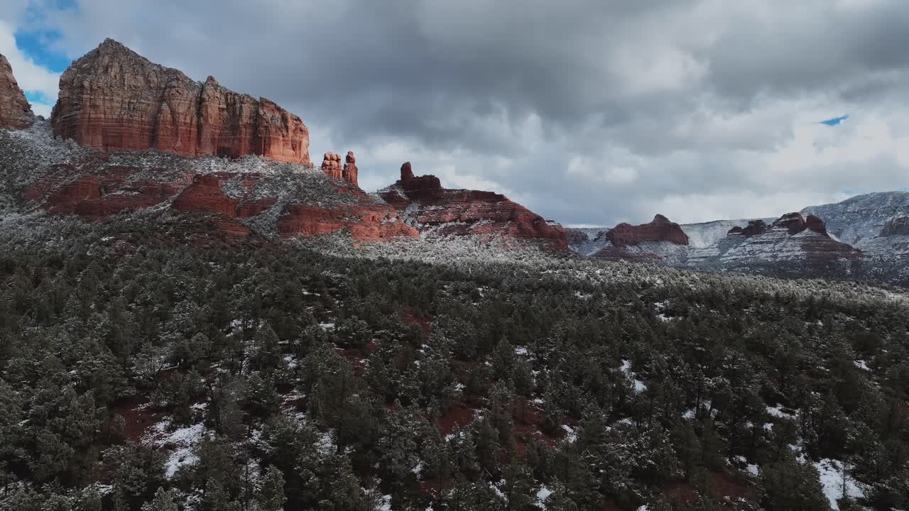 Snow Covered Red Rocks And Vegetation Near Sedona, Arizona - Drone Shot