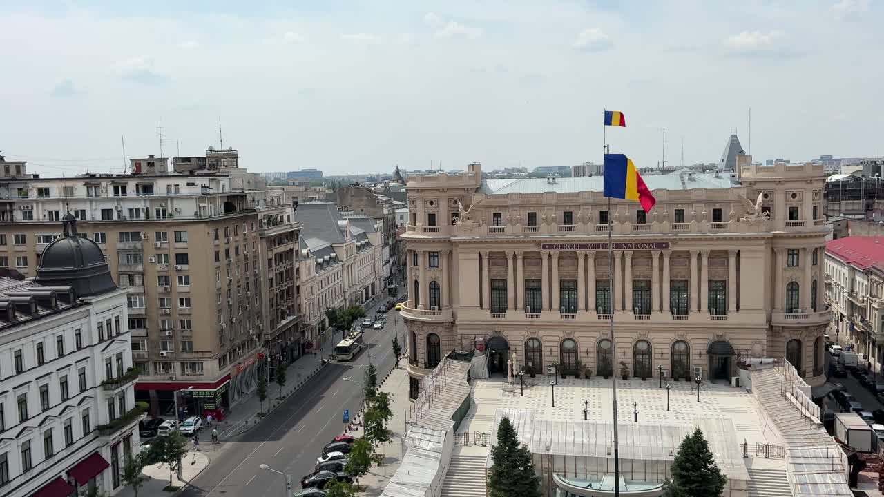 Revolution Square to Carol I Library with flags in Bucharest, Elevated right pan