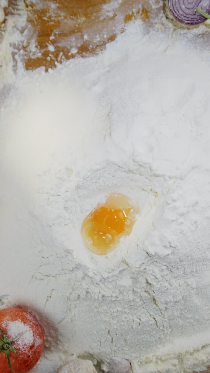 Preparing Dough with Egg and Flour