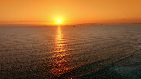 relaxing view of the waterscape lit by the soft light of setting sun. beautiful scenery of the pacific ocean at sunset. top view.