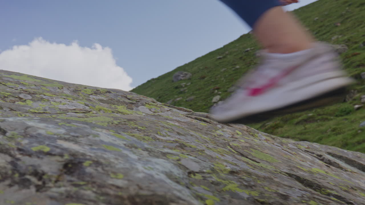 Two hikers explore Saas-Fee, Saas-Balen, and the Saas-Almagell dam, passing waterfalls, marmots, and alpine peaks in a breathtaking high-mountain landscape.