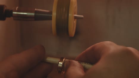 polishing a gold ring