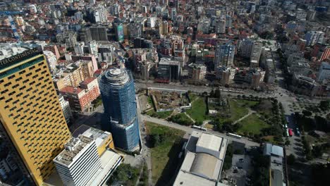 Tirana's-Skyline:-Towering-Structures-in-the-Heart-of-Albania's-Capital,-with-Suburban-Neighborhoods-in-the-Background,-Reflecting-City's-Progress