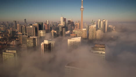 fog rolling into the toronto city skyline from the waterfront