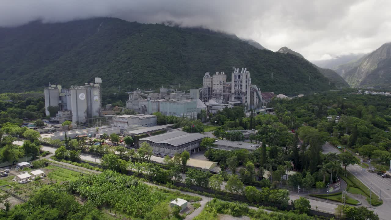 Circular aerial view of the local cement factory at Xincheng Township in Hualien County, Taiwan, entrance to the beautiful Taroko National Park on the east coast of the Island of Taiwan