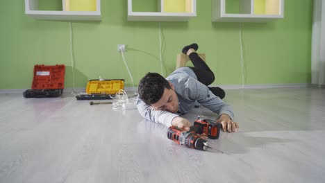 young man who had a work accident at home is fainting.