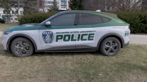 Michigan-State-University-police-car-on-the-campus-of-Michigan-State-University,-the-site-of-a-mass-shooting-in-February-of-2023