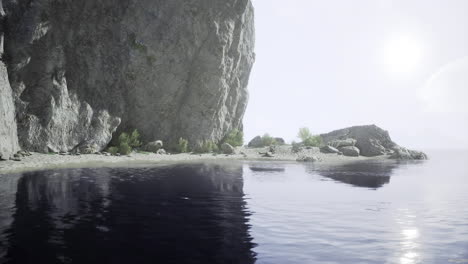serene coastal landscape with rocky cliffs and calm waters at sunset