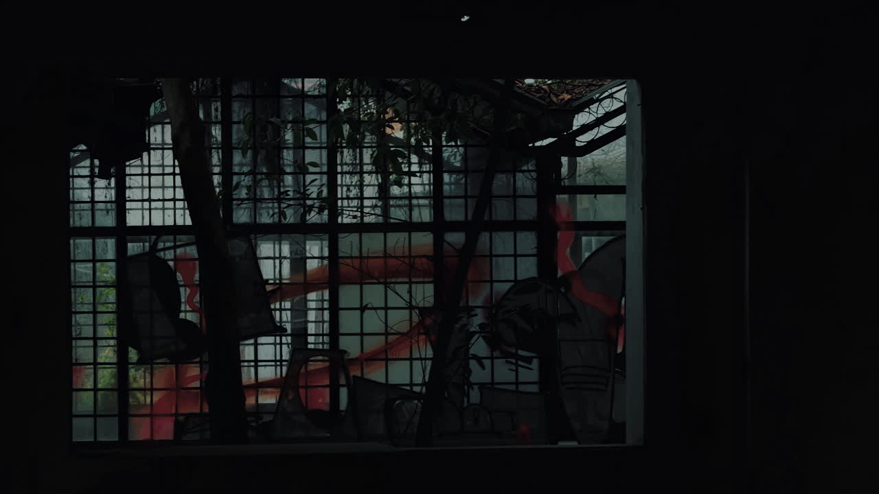 Abandoned Building Interior with Windows and Graffiti