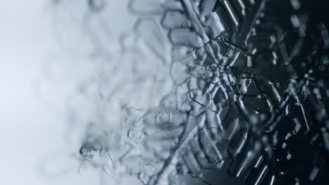 snowflake ice crystal stellar dendrite under microscope