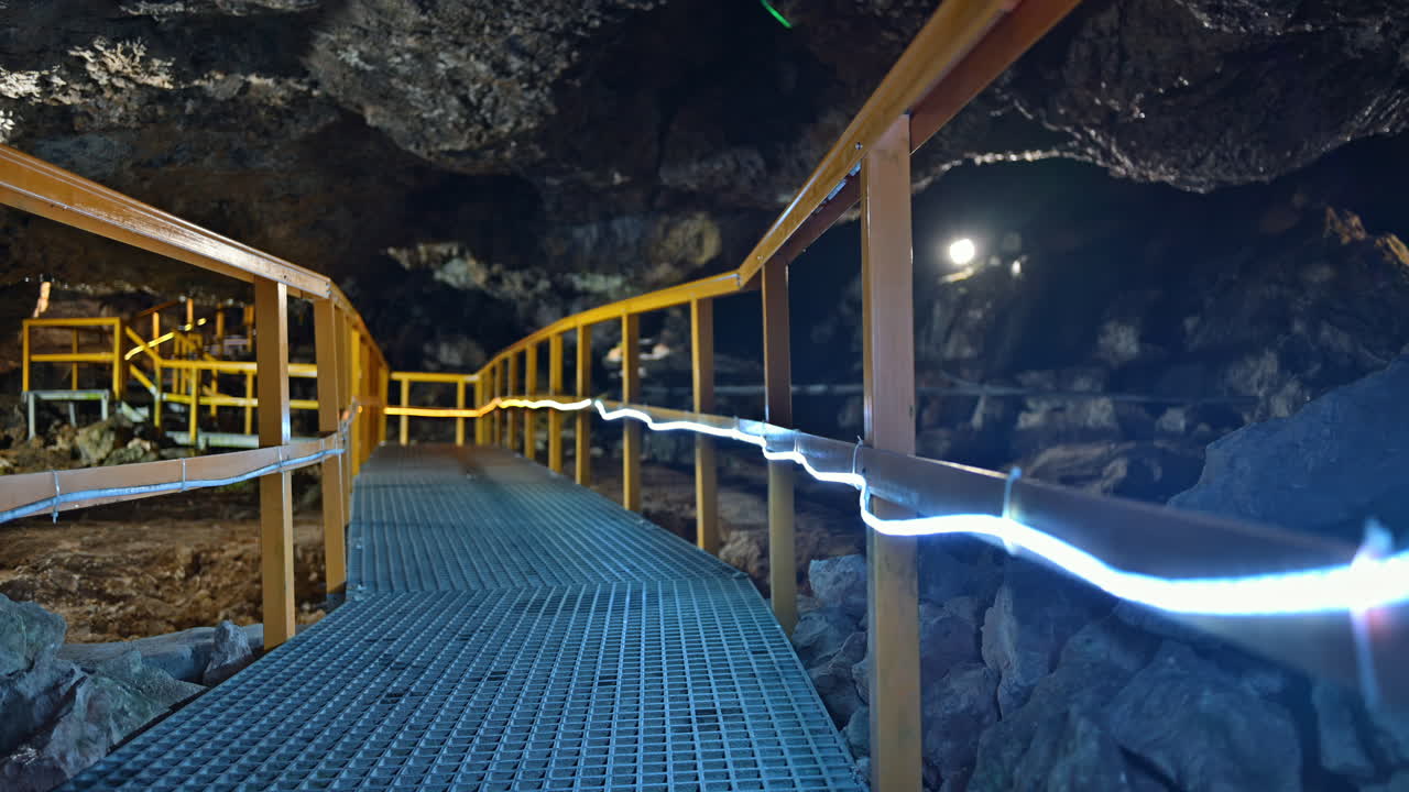 Stairs and rails inside of the Ialomita Cave in the Bucegi Mountains in Romania