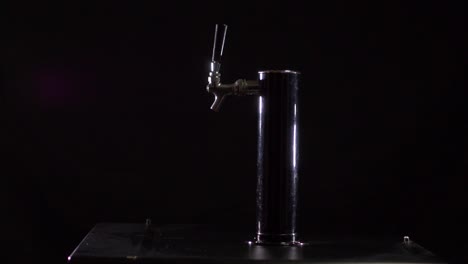 Bartender-pours-beer-into-glass