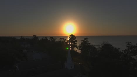 aerial view of sunset near a church in fairhope, alabama