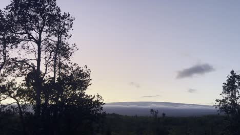 Cinematic-wide-panning-shot-of-majestic-Mauna-Loa-at-sunset-on-the-Big-Island-of-Hawai'i