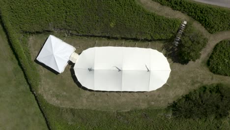 Marquee-Tent-On-The-Windy-Hill-Top-Cliffs-At-The-Beacon-Crag-In-West-End,-Porthleven,-United-Kingdom