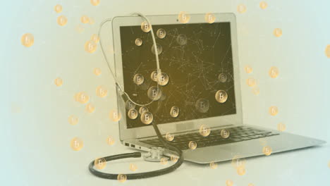 animation of bitcoin symbols against laptop and stethoscope against grey background