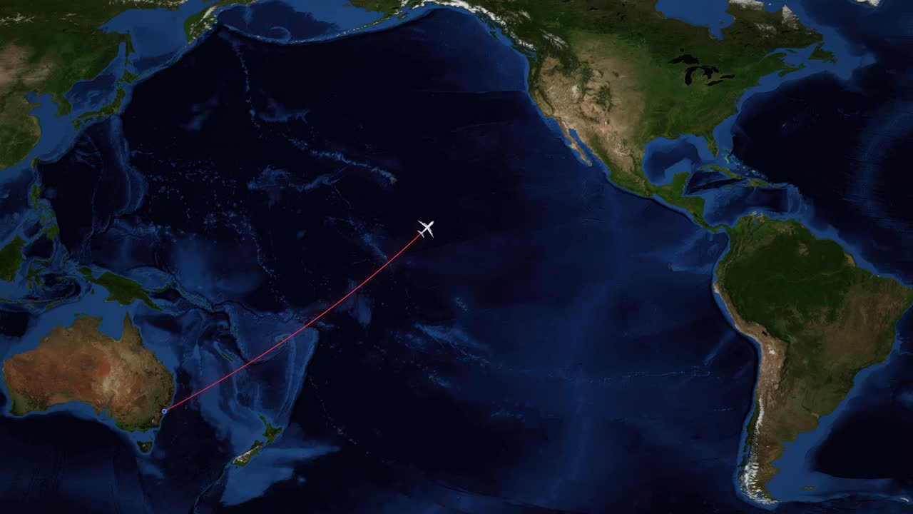 A red line tracks an airplane flying across the Pacific Ocean on a world map