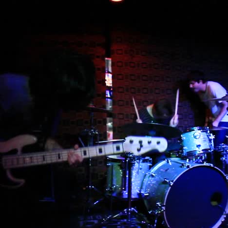 Selective-focus-view-of-a-band-performing-in-a-small-venue