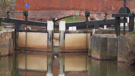 4k view of a canal gate in the bridgewater and taunton canal