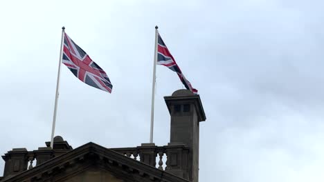 close up view of uk united kingdom flags blowing in the wind south shields north east england uk