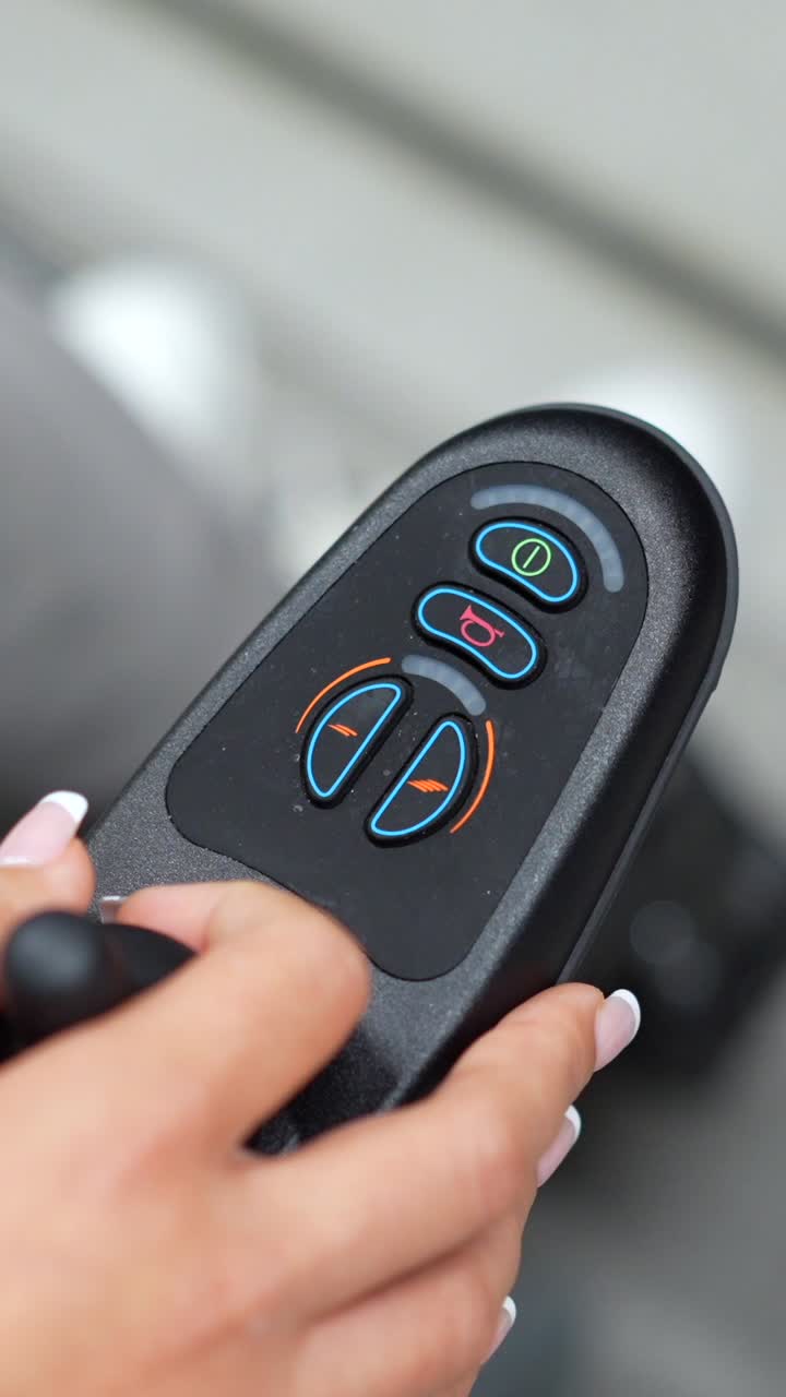 Close-up of a remote control with buttons