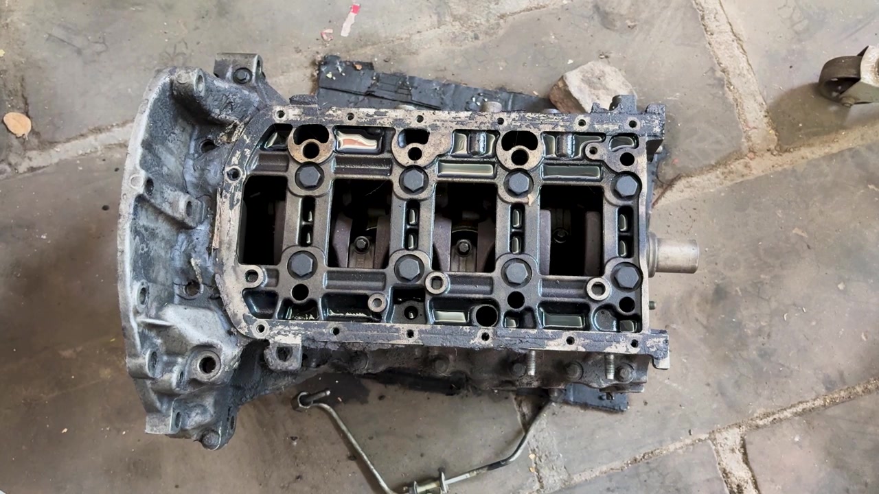 Disassembled Car Engine Block During Automotive Repair and Engine Overhaul Process