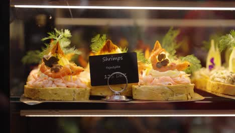 creative danish shrimp sandwich close up with price tag in front, copenhagen