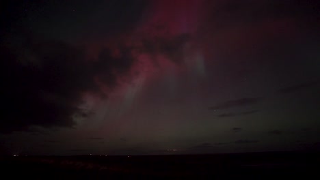 stunning aurora borealis display: red and green northern lights