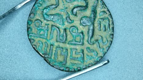 close up of very old coins