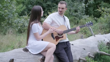 couple enjoying music in nature
