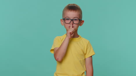 Toddler-children-boy-presses-index-finger-to-lips-makes-silence-gesture-sign-do-not-tells-secret