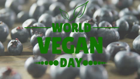 animación del texto del día vegano mundial sobre arándanos frescos