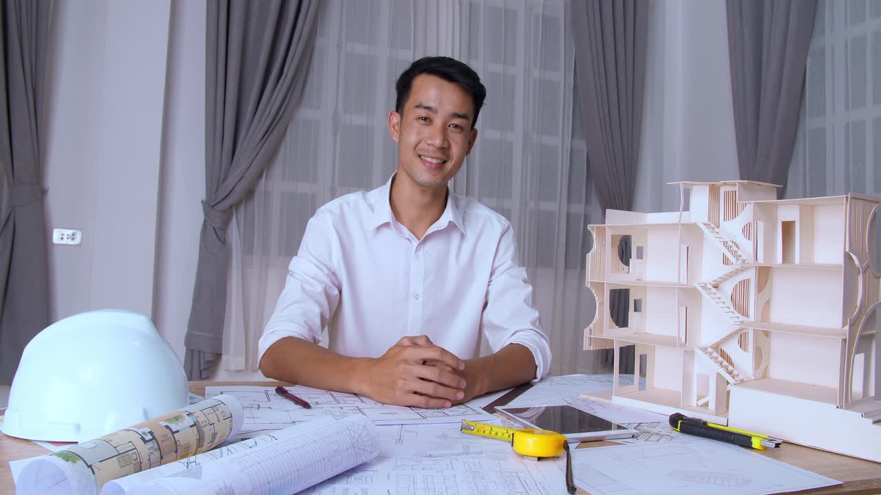 Young Architect Smiling And Looking At Camera