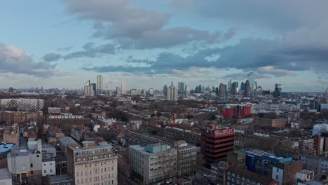 slider drone shot of london skyscrapers from camden