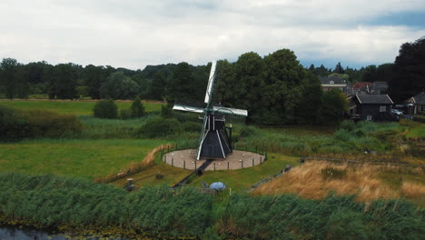 keppel water mill: aerial view travalling in to the beautiful mill located in the netherlands and on a sunny day