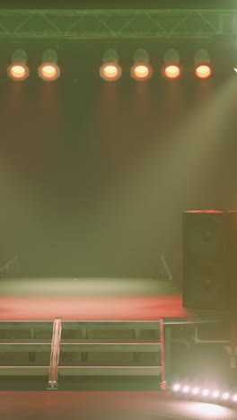 empty stage with lights and speakers