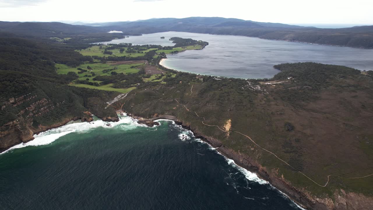 Aerial Shot Of Remarkable Cave, Penguin Rocks, Maingon Bay Lookout With Safety Cove State Reserve In Port Arthur, Tasmania, Australia