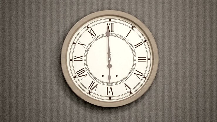 Timelapse of Vintage clock on dark wall. Frontal view.