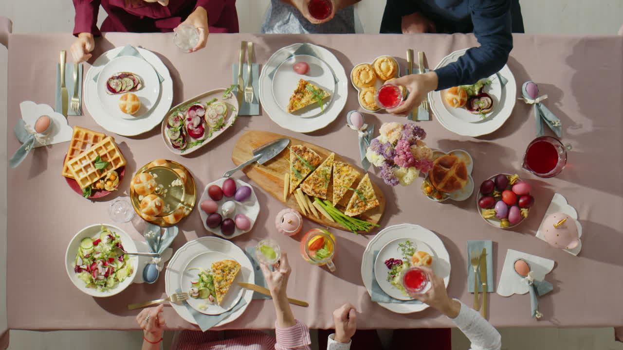 Top Down of Family Clinking Glasses on Easter Dinner