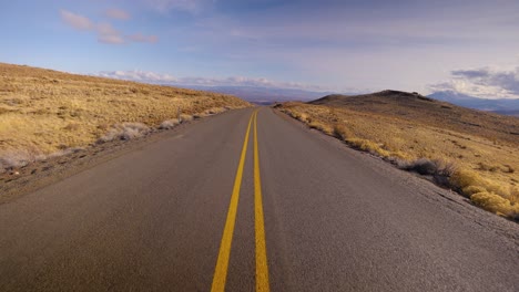 Mountain-walk-smooth-walking-first-person-perspective-on-desolate-road-in-east-oregon