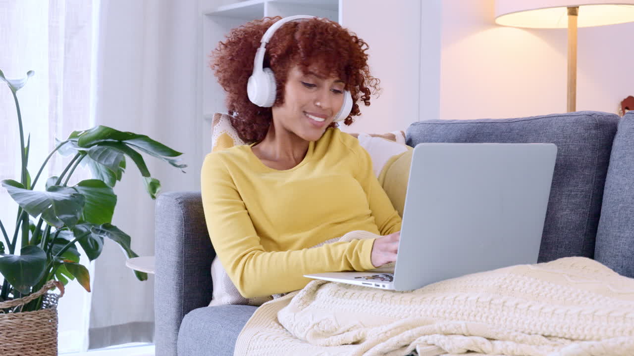Happy woman enjoying music streaming service