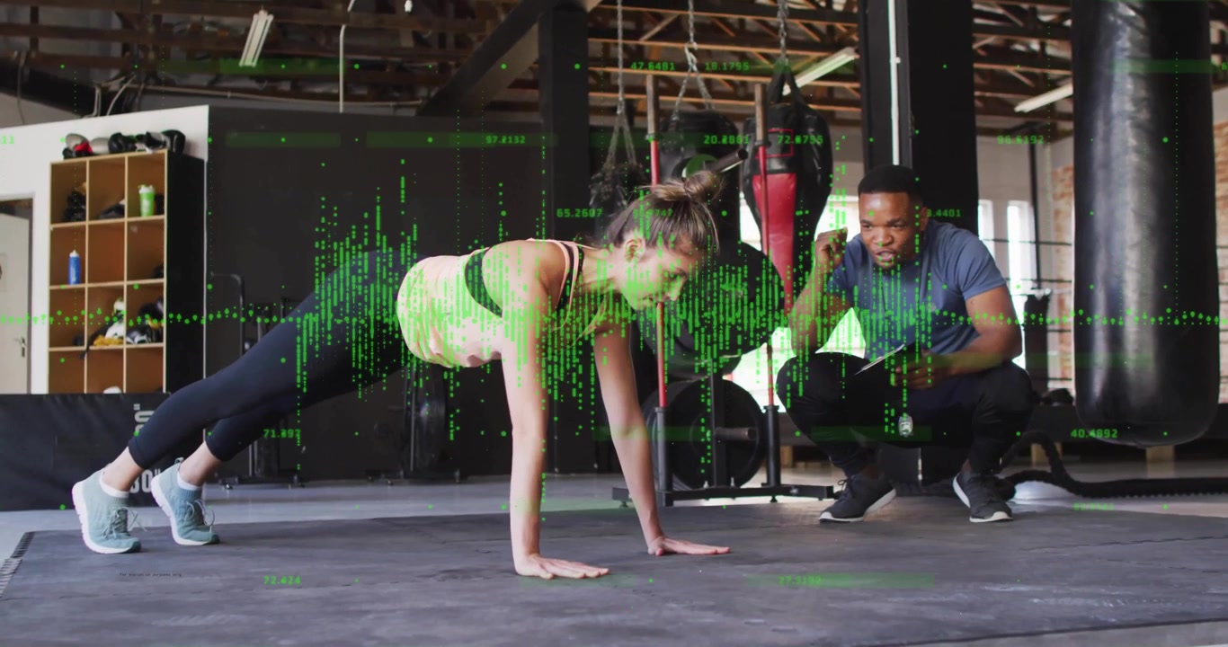 Female client performing push-up sets after trainer cue while fitness tablet overlay tracking reps