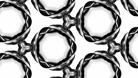 animación en bucle sin costuras de 4k de patrón en blanco y negro con cintas son retorcidas y forman estructuras complejas como patrón de adorno simétrico o efecto caleidoscópico