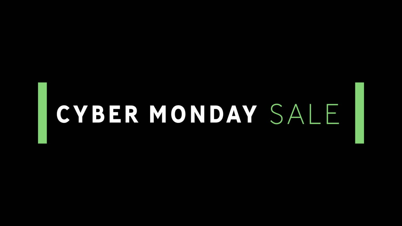 texto de venta blanco y verde de cyber monday que aparece contra una pantalla negra