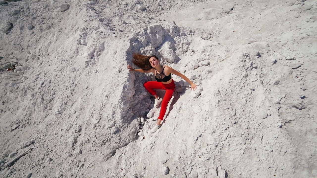 Woman Posing in a White Powdery Hill