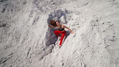woman posing in a white powdery hill