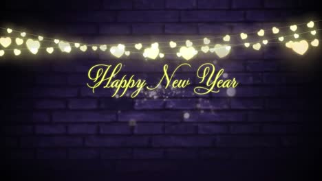happy new year with a glowing string of fairy lights