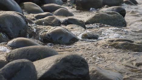 River-Current-Flow-Over-Rocks,-Close-Up