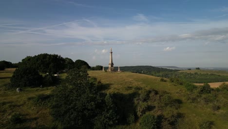 a sweeping pan of a monument located on a hill